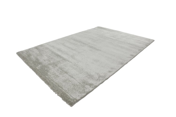 Rechteckiger Hochflor-Teppich in Grau mit weicher Oberfläche.