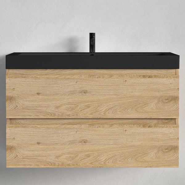 Wandhängender Waschbeckenunterschrank in Eichenoptik mit zwei Schubladen und schwarzem Waschbecken inklusive Armatur.
