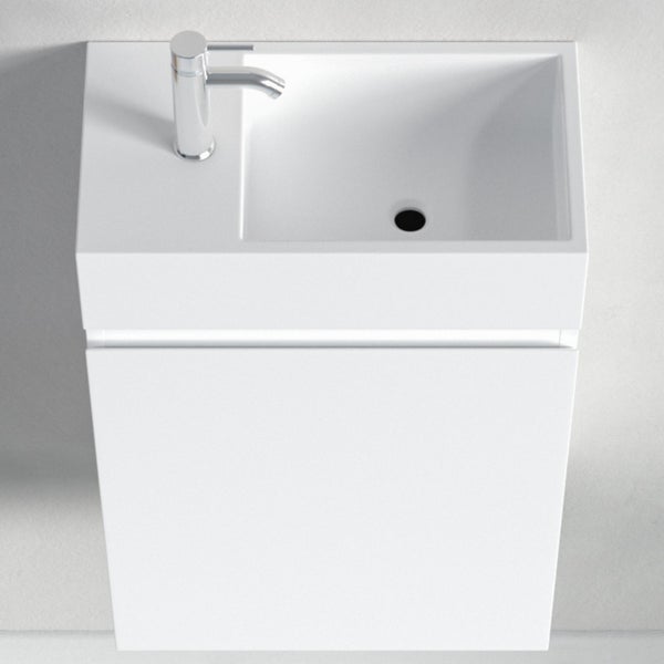 Ein kleines Waschtisch Set mit einem Waschbecken und einem passenden Waschtischunterschrank inklusive Wasserhahn in der Draufsicht.