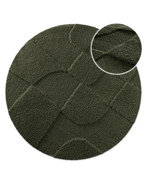 Runder dunkelgrüner Teppich mit geometrischem Strukturmuster und Detailansicht der Oberfläche.