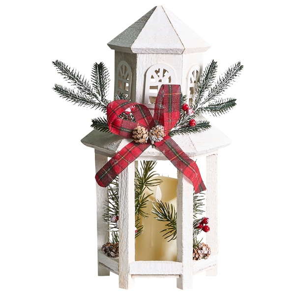 Dekorative weiße Laterne mit Schleife, Tannenzweigen und Kerze als Weihnachtsdekoration