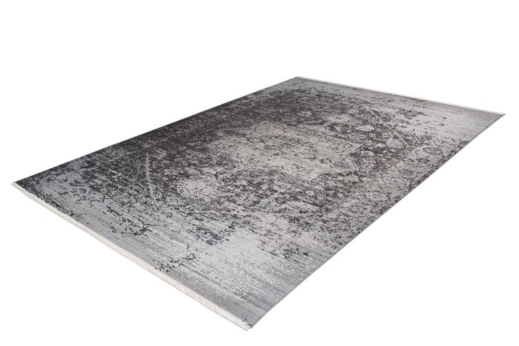 Rechteckiger grauer Teppich mit verwaschenem orientalischem Muster im Vintage-Stil.