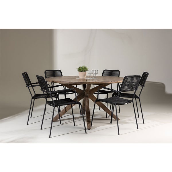 Runder Gartentisch aus Holz mit sechs schwarzen Stühlen