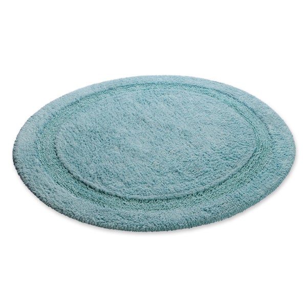 Runder Badeteppich aus weichem Material in Hellblau mit kreisförmigem Design.