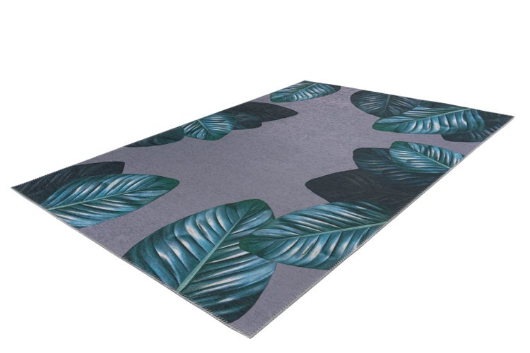 Rechteckiger Teppich mit tropischem Blattmuster am Rand auf grauem Grund.