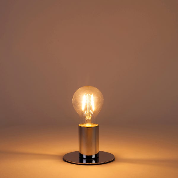 Tischleuchte mit Metallsockel und Glühbirne