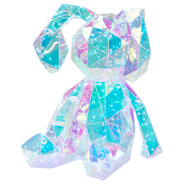 Dekoratives Arrangement mit Kissen, Decke, Kerzen und Dekorationen auf einem Sofa