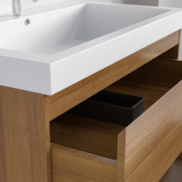 Moderner Waschtisch aus Holz mit weißem Waschbecken und einer geöffneten Schublade mit schwarzem Organizer.