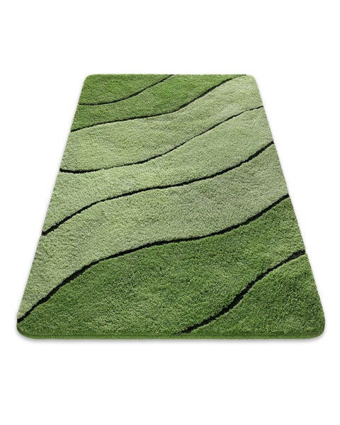 Hochflor-Teppich mit Wellenmuster in verschiedenen Grüntönen.
