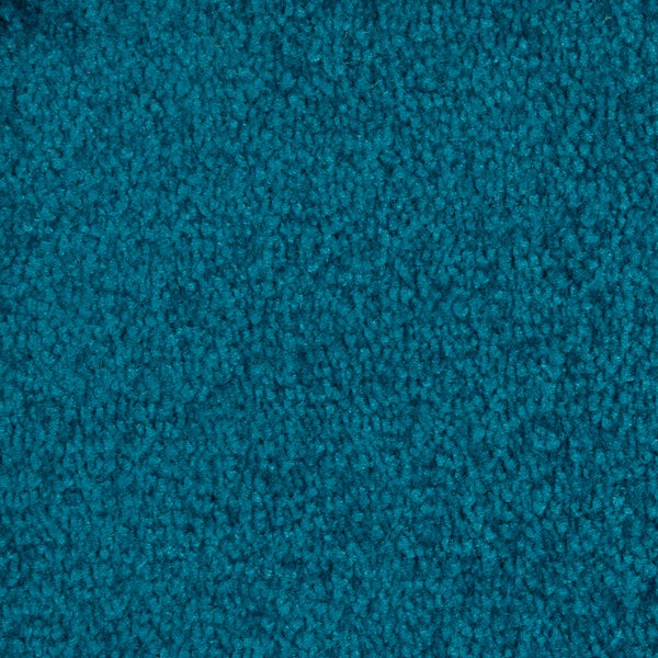 Nahaufnahme der Textur eines petrolfarbenen Schlingenteppichs.