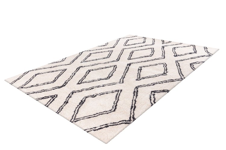 Hochflor-Teppich mit geometrischem Rautenmuster in Creme und Dunkelgrau.