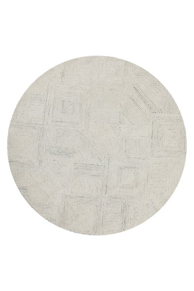 Runder Teppich mit geometrischem Reliefmuster aus Quadraten und Linien.