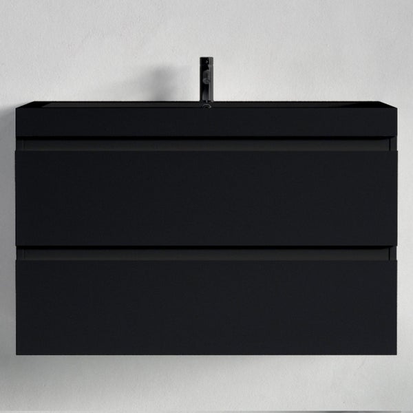 Schwarzer Waschtischunterschrank mit zwei Schubladen und schwarzer Armatur.