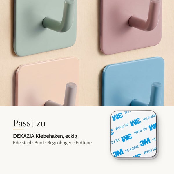 Set aus vier eckigen DEKAZIA Klebehaken aus Edelstahl mit selbstklebender Rückseite für die Wandmontage.