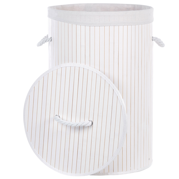 Säulenzypressen in Pflanztöpfen auf einem Transportwagen im Gartencenter.