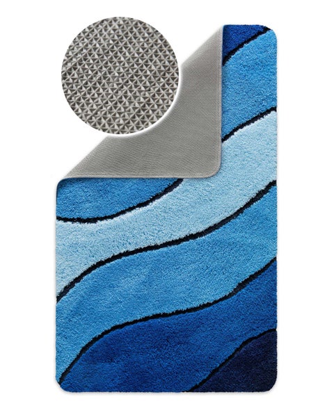Blauer Badteppich mit Wellenmuster und rutschhemmender Rückseite sowie Detailansicht der Noppenstruktur.