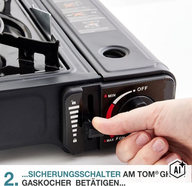 Hand bedient den Sicherungsschalter am TOM Gaskocher GK 227 zur Verriegelung der Gaskartusche.