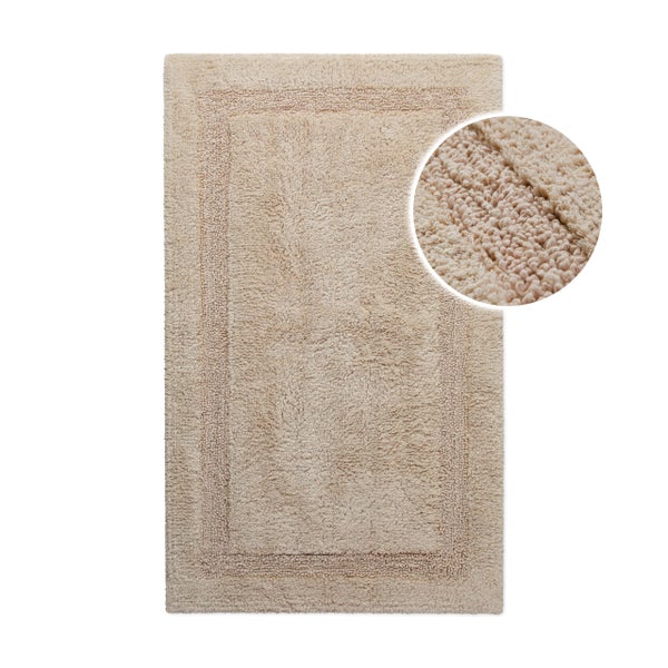 Beige rechteckige Badematte mit Bordüre und Detailansicht der Florstruktur.