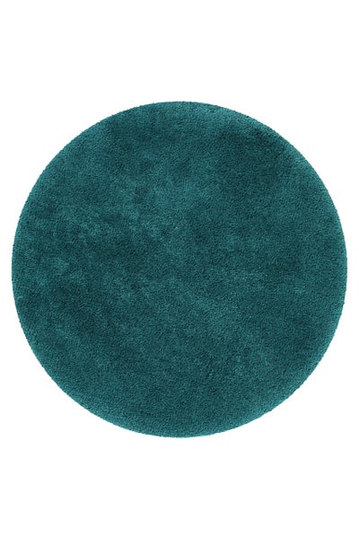Runder Hochflor-Teppich in Petrol.