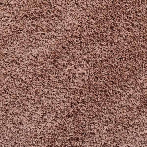 Nahaufnahme der weichen Textur eines Hochflor-Teppichs.