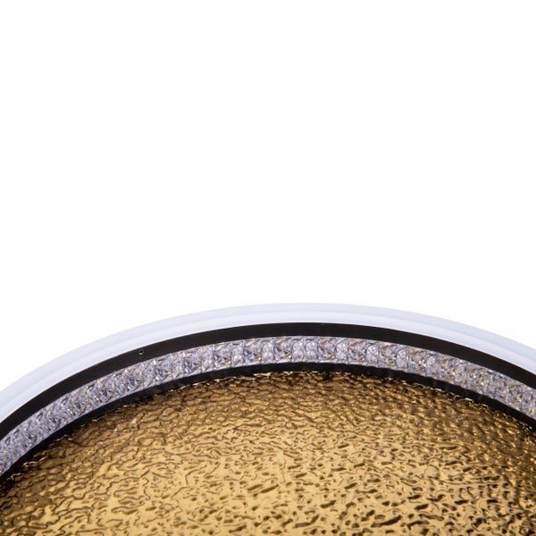 Detailansicht einer Deckenleuchte mit Kristallverzierungen und strukturierter Oberfläche.