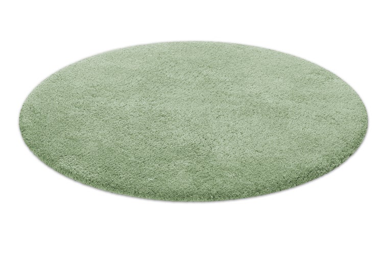 Runder Hochflor-Teppich in Hellgrün.