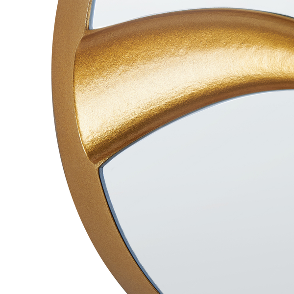 Detailansicht eines Spiegels mit goldenem Rahmen.