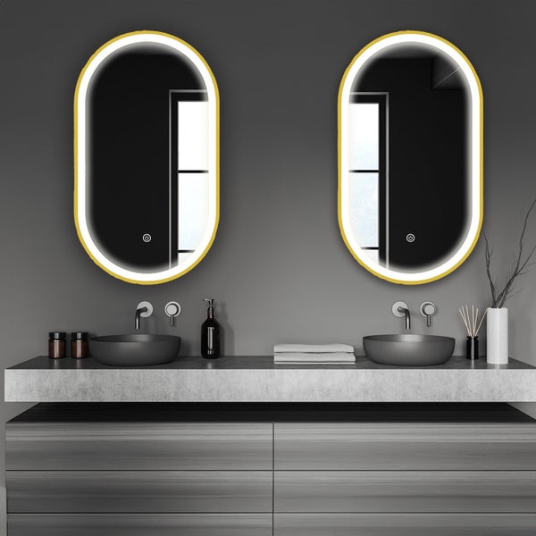 Modernes Badezimmer mit zwei ovalen LED Wandspiegeln und Doppelwaschtisch auf einem Waschtischunterschrank mit zwei Aufsatzwaschbecken.