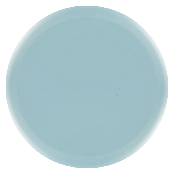 Wohnzimmer mit Sofa, Teppich, Lampe und Kommode