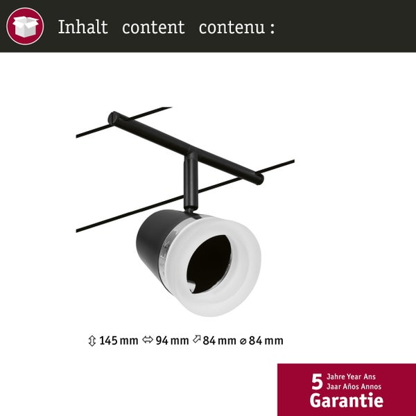 Wohnzimmer mit Dachschrägen, Sofa, Schreibtisch und Schienensystem mit Strahlern.