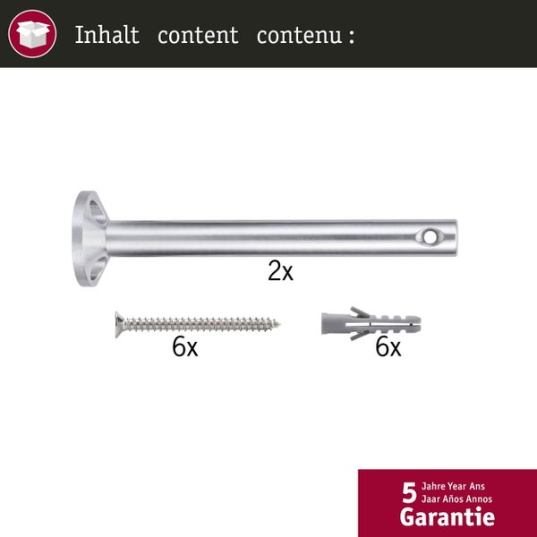 Fensterbank mit Zimmerpflanzen und einer Tischleuchte.