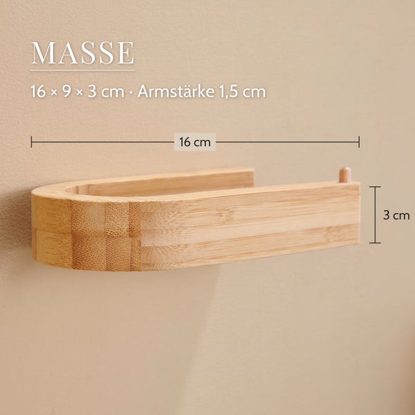 Toilettenpapierhalter aus Bambus zur Wandmontage mit Maßangaben 16 mal 9 mal 3 Zentimeter und einer Armstärke von 1,5 Zentimeter.
