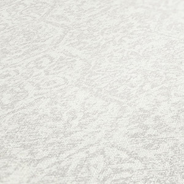 Nahaufnahme einer weißen Textiltapete mit Muster