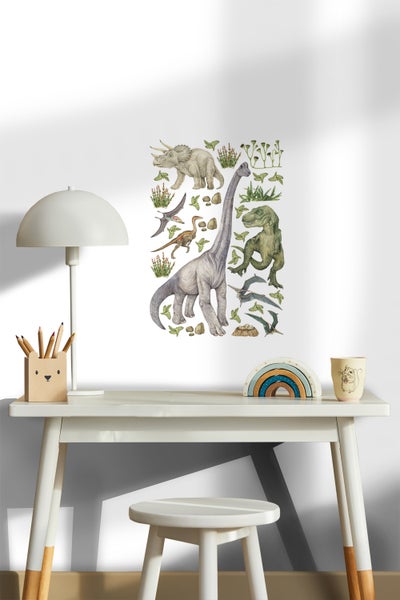 Dekoratives Wandtattoo mit Dinosaurier-Motiven im Kinderzimmer