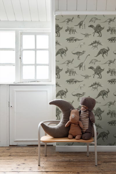 Smartphone zeigt Kinderzimmer mit verschiedenen Tapetenoptionen