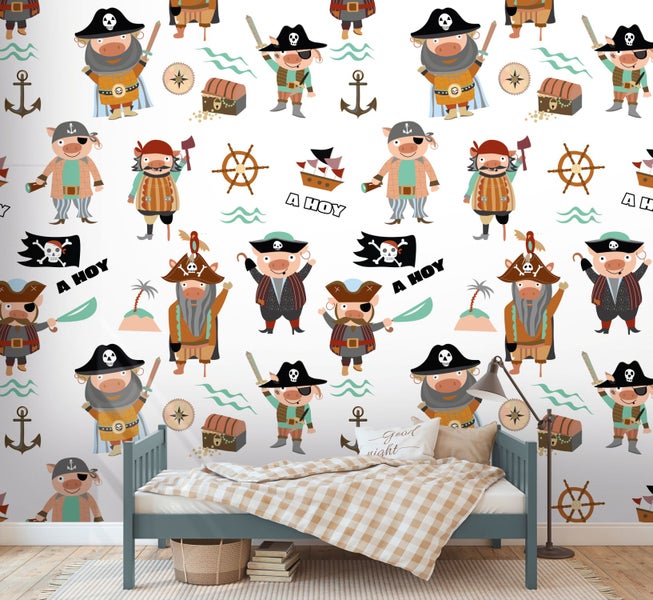 Kinderzimmer mit Wandtapete mit Piratenmotiven, Bett und Dekoration