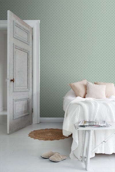 Nahaufnahme einer Hecke mit grünen Blättern.