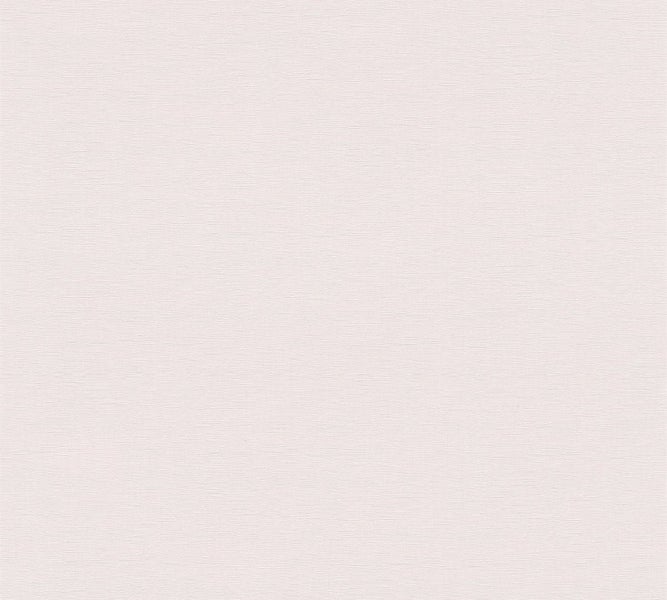 Schlafzimmer mit Bett, Nachttisch und Zimmerpflanzen