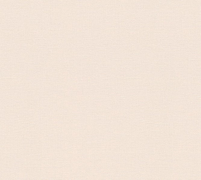 Wohnzimmer mit rosa Sideboard, Lampe und Dekoration