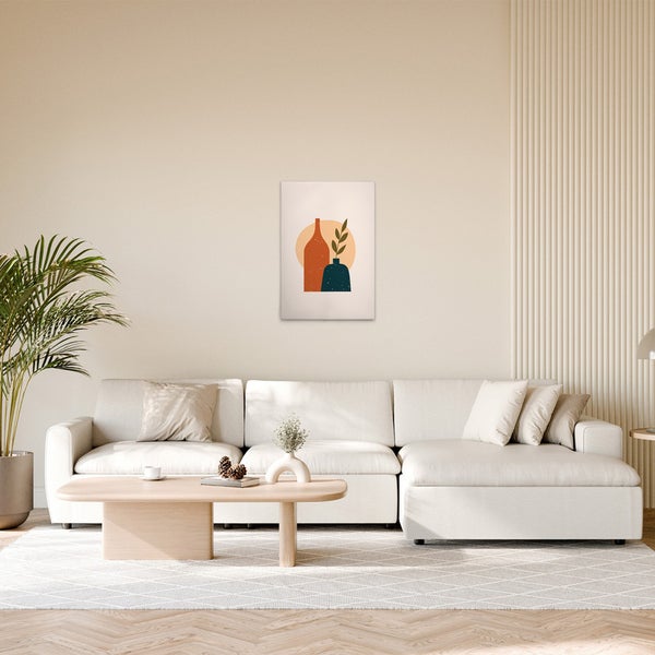 Dekorative Leinwand mit Vasenmotiv im Wohnzimmer