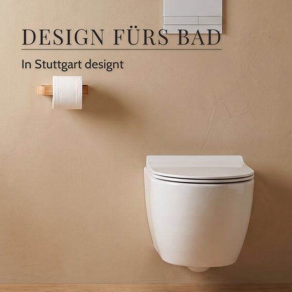 Wandhängendes WC mit Toilettenpapierhalter und Unterputz Betätigungsplatte an einer Wand mit der Aufschrift Design fürs Bad