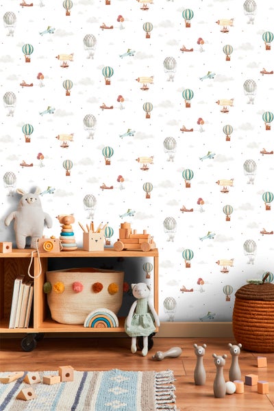 Kinderzimmer mit Möbeln und Tapete mit Flugzeug- und Ballonmuster