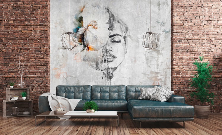 Wohnzimmer mit Ecksofa, Couchtisch und Wandbild