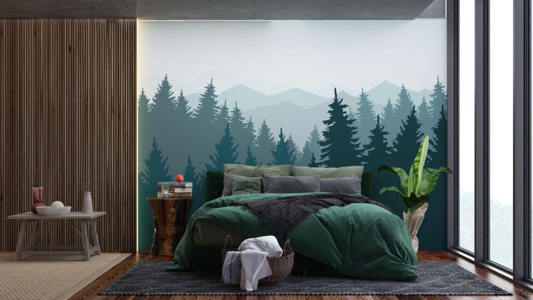 Schlafzimmer mit Waldtapete, Bett und Holzelementen