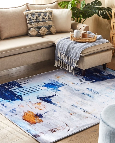 Abstraktes Gemälde mit blauen und goldenen Akzenten auf Leinwand