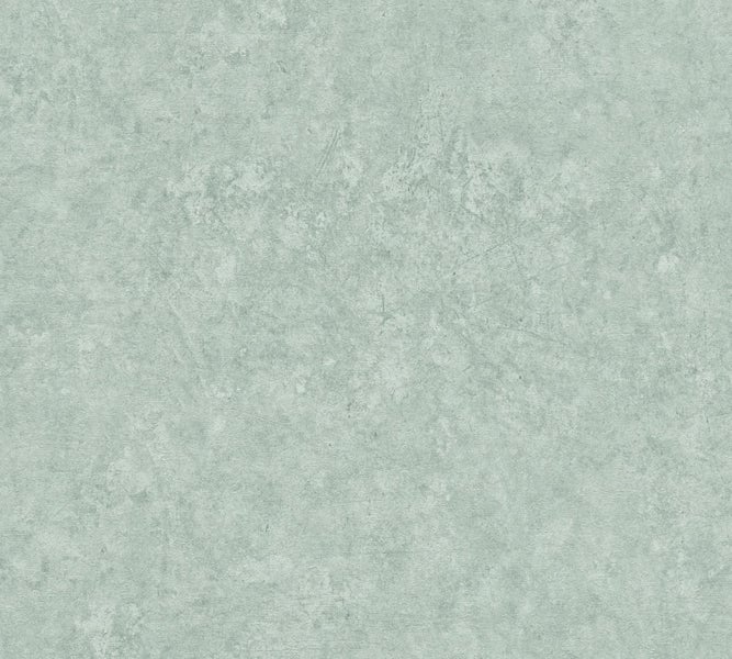 Esstisch mit vier Stühlen und Tischdekoration vor einer Wand