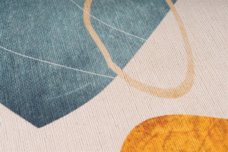 Detailansicht eines strukturierten Gewebes mit einem abstrakten geometrischen Muster.