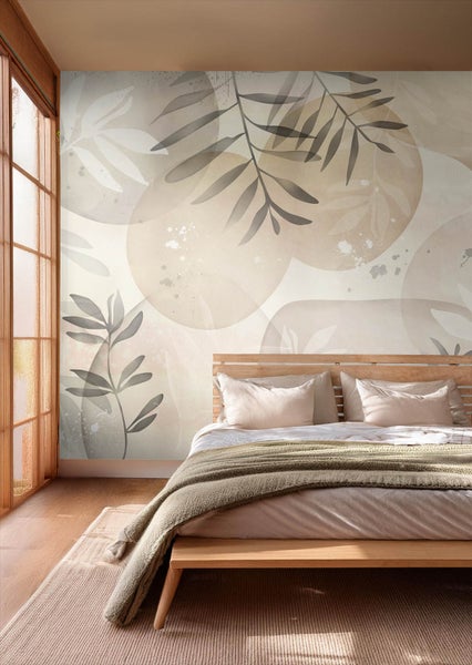 Schlafzimmer mit Fototapete mit Pflanzenmotiven, Bett und Tagesdecke