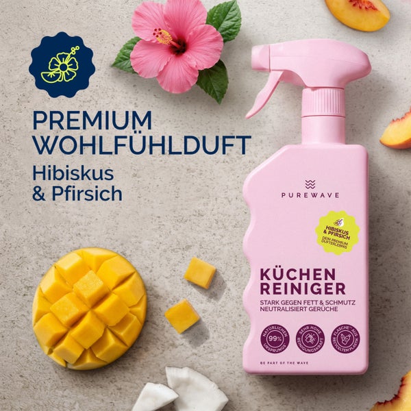 Purewave Küchenreiniger Hibiskus und Pfirsich in Sprühflasche mit Hibiskusblüte, Pfirsichstücken und Mangowürfeln.