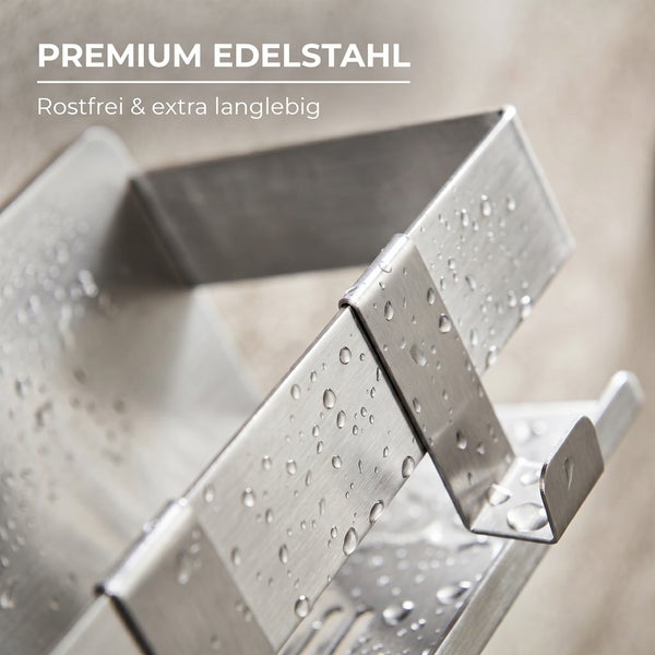 Detailansicht einer Duschablage aus hochwertigem Edelstahl mit Wassertropfen, rostfrei und langlebig.